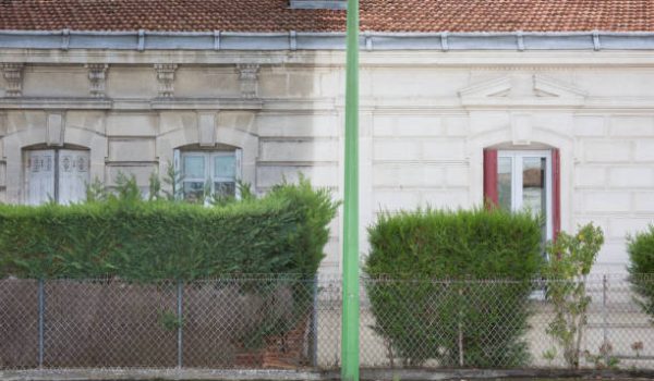 Difference between wash cleaned house facade and dirty one before and after